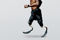 Man paralympic athlete running with prosthetic legs