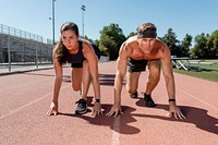 Man and woman athletes racing against each other 