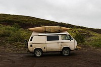 Free car with canoe parked on the side of the road image, public domain CC0 photo.