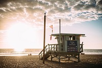 Free beach hut at sunset image, public domain travel CC0 photo.