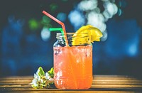 Free orange cocktail on wooden table photo, public domain beverage CC0 image.