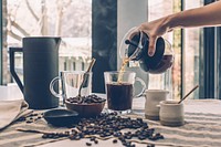 Free hand pouring coffee photo, public domain drink CC0 image.