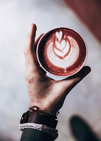 Free latte art in a hand image, public domain food & beverage CC0 photo.