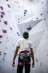 Free person climbing indoor rock wall photo, public domain sport CC0 image.