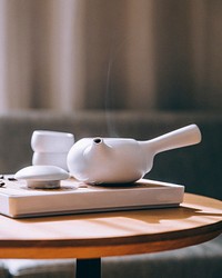 Free white ceramic teapot set on the table photo, public domain beverage CC0 image.