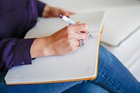 Free woman writing on notebook image, public domain design CC0 photo.