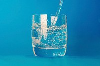 Free glass water minimal blue background photo, public domain beverage CC0 image.