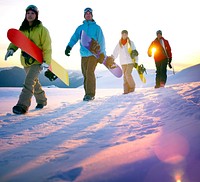 People on their way to snow boarding.