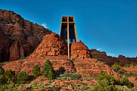 Tower of the Chapel of the Holy Cross in Sedona, Arizona, a small city and popular tourist attraction thanks to its red sandstone formations, which glow brilliant orange or red when illuminated by the rising or setting sun.