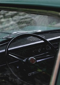 Car interior, steering wheel photo, free public domain CC0 image.