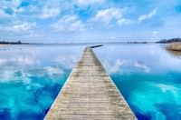 Boardwalk to deep blue lake, free public domain CC0 photo.