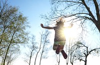 Free girl on trampoline image, public domain person CC0 photo.