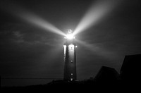 Free lighthouse at night in black and white  image, public domain CC0 photo.