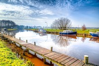 Free boat moored to dock in canal image, public domain CC0 photo.