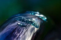 Water drop on faucet close up, public domain CC0 photo.