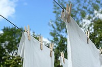 Free close up hanging white shirts image