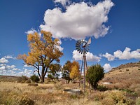 Fall scene, including a vintage windmill, near Springerville, a community near the New Mexico border in the White Mountains of east-central Arizona. Original image from <a href="https://www.rawpixel.com/search/carol%20m.%20highsmith?sort=curated&amp;page=1">Carol M. Highsmith</a>&rsquo;s America, Library of Congress collection. Digitally enhanced by rawpixel.