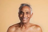 Happy bare chested mixed Indian senior man
