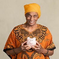 Happy mixed Indian man holding a piggy bank mockup 