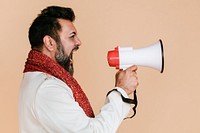 Indian man screaming into a megaphone 