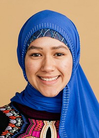 Happy Islamic woman in a blue hijab