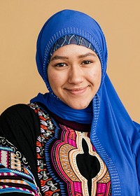 Happy Islamic woman in a blue hijab