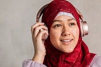 Muslim woman listening to music