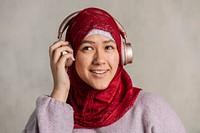 Muslim woman listening to music