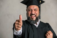 Happy senior man completing his master's degree