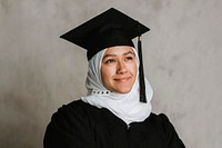 Proud muslim woman in a graduation gown 