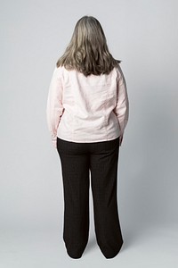 Rear view of a senior woman in studio shoot 