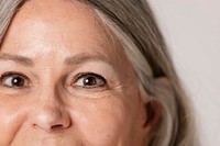 Cropped face of a happy senior woman