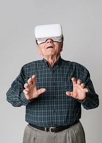 Senior man wearing virtual reality goggles mockup