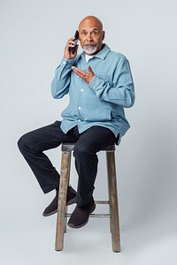 Happy retired man on the phone 