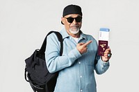 Happy black senior traveler with an air ticket and passport 