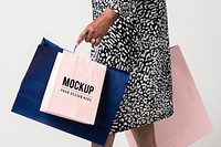 Black woman carrying shopping bag mockups 