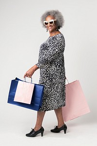 Happy senior woman on a shopping spree