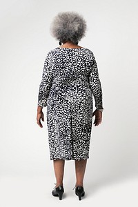 Rear view of a stylish black senior woman with afro hair 
