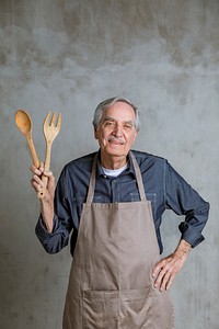 Senior American man wearing an apron