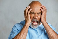 Senior patient having a migraine