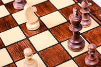 Free wood chess board with pieces photo, public domain game CC0 image.