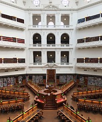 Free big open, multiple level library full of books photo, public domain CC0 image.