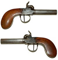 Old wooden hand guns, free public domain CC0 image.