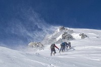 Free people hiking in snow mountain photo, public domain sport CC0 image.