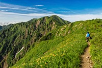 Free person hiking on mountain photo, public domain nature CC0 image.