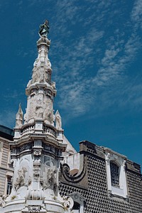 Obelisk Guglia of Immaculate Virgin on Gesu Nuovo square in Naples, Italy