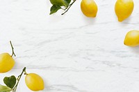 Fresh lemons on white marble background flatlay