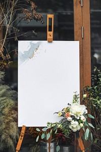 A craft painting on a canvas standing on a easel mockup