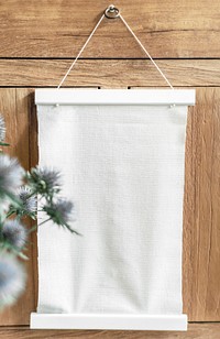 A hanging frame on a wooden wall
