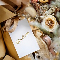 Bouquet of dry poppies with a white card mockup